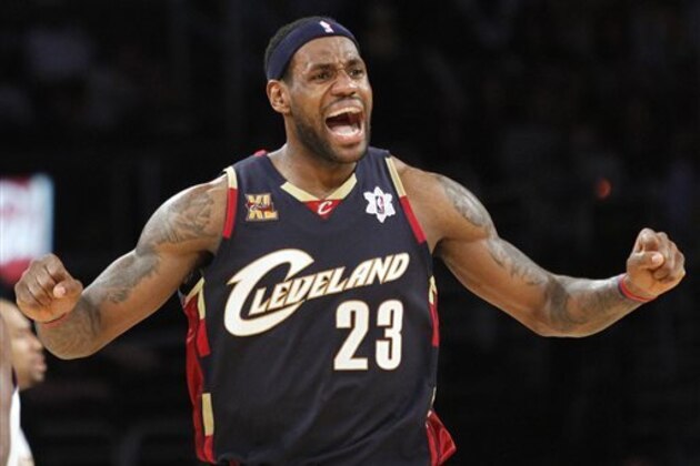 FILE - In this Dec. 25, 2009 file photo, Cleveland Cavaliers forward LeBron James reacts during the second half against the Los Angeles Lakers in an NBA basketball game in Los Angeles. James told Sports Illustrated on Friday, July 11, 2014, he is leaving the Miami Heat to go back to the Cleveland Cavaliers. (AP Photo/Lori Shepler, File)