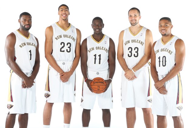 METAIRIE, LA - SEPTEMBER 30: Tyreke Evans #1 Jrue Holiday #11, Anthony Davis #23, Ryan Anderson #33 and Eric Gordon #10 of The New Orleans Pelicans pose for photos during NBA Media Day on September 30, 2013 at the New Orleans Pelicans practice facility in Metairie, Louisiana. NOTE TO USER: User expressly acknowledges and agrees that, by downloading and or using this Photograph, user is consenting to the terms and conditions of the Getty Images License Agreement. Mandatory Copyright Notice: Copyright 2013 NBAE (Photo by Layne Murdoch/NBAE via Getty Images)