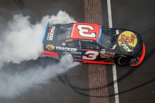 INDIANAPOLIS, IN - JULY 26:  Ty Dillon, driver of the #3 Bass Pro Shops Chevrolet, celebrates with a burnout after winning the NASCAR Nationwide Series Lilly Diabetes 250 at Indianapolis Motor Speedway on July 26, 2014 in Indianapolis, Indiana.  (Photo by Chris Graythen/Getty Images)