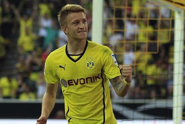 Dortmund's Marco Reus celebrates after scoring during the Supercup final soccer match between BvB Borussia Dortmund and Bayern Munich in Dortmund, Germany, Saturday, July 27, 2013. (AP Photo/Frank Augstein)