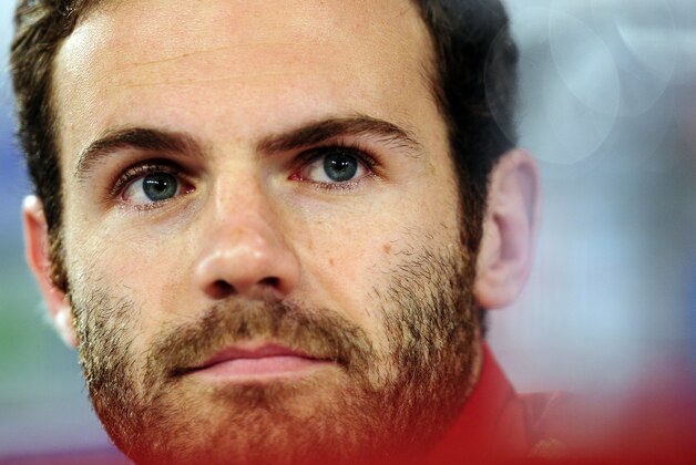 Spain's Juan Mata looks on, during a press conference at the Atletico Paranaense training center in Curitiba, Brazil, Monday, June 16, 2014. Spain will play Chile in group B World Cup soccer match on Wednesday.  (AP Photo/Manu Fernandez)