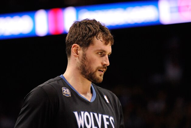 Mar 14, 2014; Charlotte, NC, USA; Minnesota Timberwolves forward center Kevin Love (42) during the second half of the game against the Charlotte Bobcats at Time Warner Cable Arena. Bobcats win 105-93. Mandatory Credit: Sam Sharpe-USA TODAY Sports