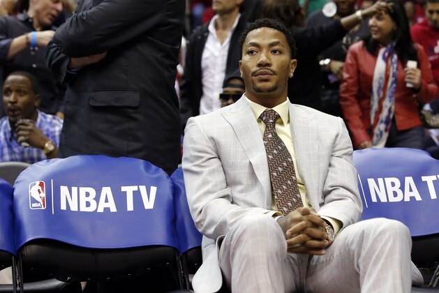 Chicago Bulls guard Derrick Rose (1) sits on the bench in the first half of Game 3 of an opening-round NBA basketball playoff series against the Washington Wizards, Friday, April 25, 2014, in Washington. (AP Photo/Alex Brandon) Chicago Bulls guard Derrick Rose (1) sits on the bench in the first half of Game 3 of an opening-round NBA basketball playoff series against the Washington Wizards, Friday, April 25, 2014, in Washington. (AP Photo/Alex Brandon)