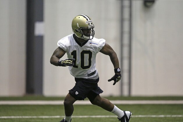 New Orleans Saints first round draft pick Brandin Cooks (10) works out during OTA workouts at their NFL football training facility in Metairie, La., Thursday, June 19, 2014. (AP Photo/Gerald Herbert)