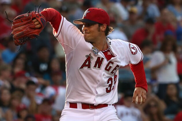 ANAHEIM, CA - JULY 04:  C.J. Wilson #33 of the Los Angeles Angels of Anaheim throws a pitch against the Houston Astros at Angel Stadium of Anaheim on July 4, 2014 in Anaheim, California.  (Photo by Stephen Dunn/Getty Images)