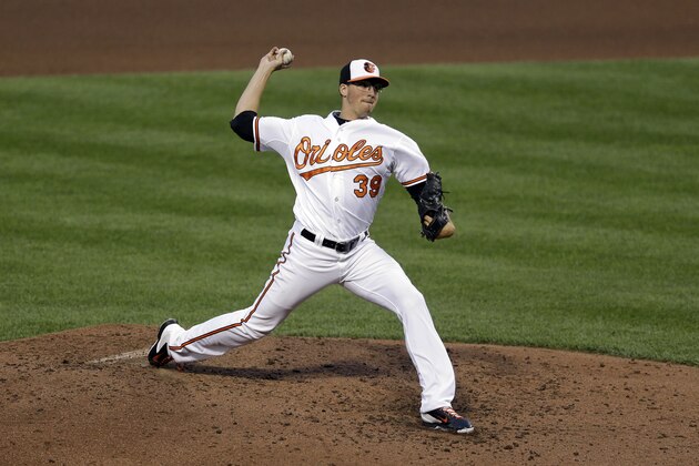 Baltimore Orioles starting pitcher Kevin Gausman throws to the Los Angeles Angels in the fourth inning of a baseball game, Wednesday, July 30, 2014, in Baltimore. (AP Photo/Patrick Semansky)