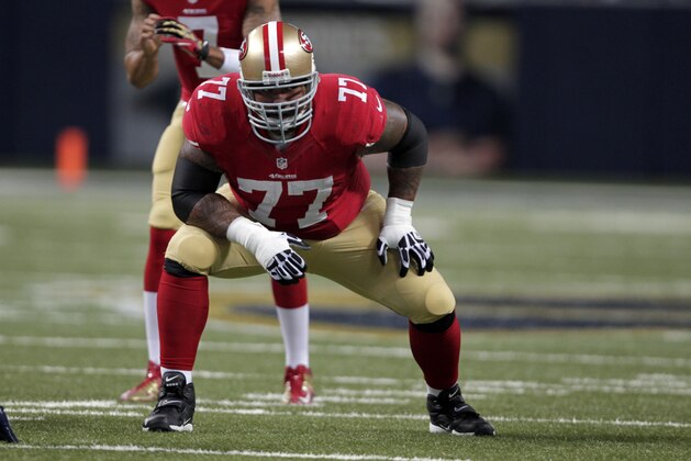 San Francisco 49ers guard Mike Iupati takes up his position during the second quarter of an NFL football game against the St. Louis Rams Thursday, Sept. 26, 2013, in St. Louis. (AP Photo/Tom Gannam)