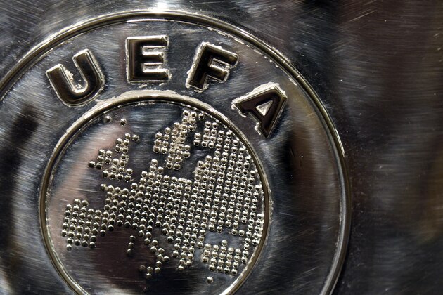 NYON, SWITZERLAND - JULY 18: The UEFA logo is seen on the UEFA Champions League trophy as it is prepared for the UEFA 2014/15 Champions League third qualifying rounds draw at the UEFA headquarters, The House of European Football, on July 18, 2014 in Nyon, Switzerland. (Photo by Harold Cunningham/Getty Images for UEFA) NYON, SWITZERLAND - JULY 18: The UEFA logo is seen on the UEFA Champions League trophy as it is prepared for the UEFA 2014/15 Champions League third qualifying rounds draw at the UEFA headquarters, The House of European Football, on July 18, 2014 in Nyon, Switzerland. (Photo by Harold Cunningham/Getty Images for UEFA)