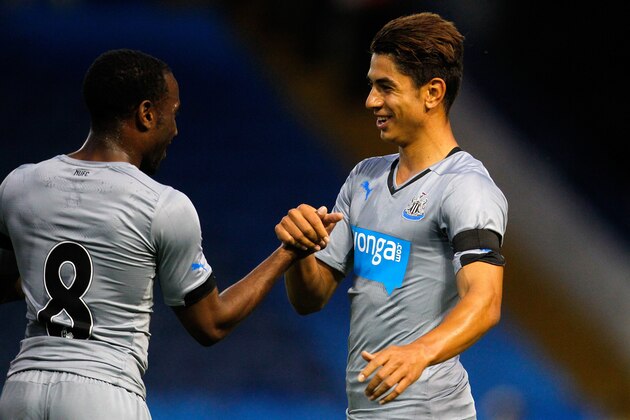 SHEFFIELD, ENGLAND - JULY 30: Ayoze Perez (R) of Newcastle celebrates his goal with team mate Vurnon Anita during the Pre Season Friendly between Sheffield Wednesday and Newcastle United at Hillsborough on July 30, 2014 in Sheffield, England. (Photo by Paul Thomas/Getty Images)