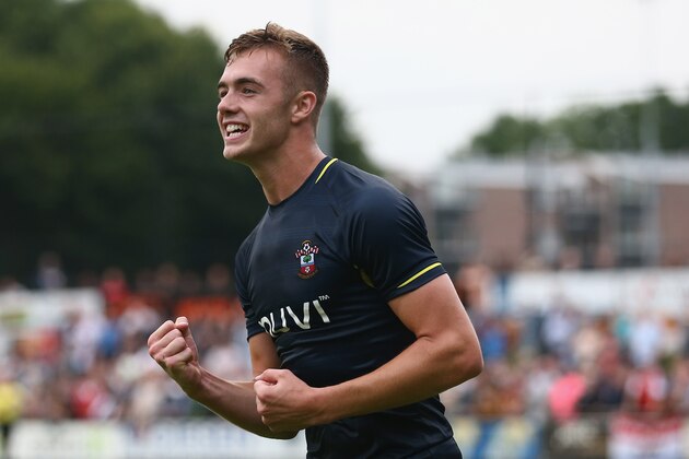 HOENSBROEK, NETHERLANDS - JULY 15:  Calum Chambers of Southampton celebrates the second goal during the pre season friendly match between EHC Hoensbroek and Southampton at Sportpark De Dem on July 15, 2014 in Hoensbroek, Netherlands.  (Photo by Christof Koepsel/Getty Images)