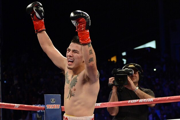 CARSON, CA - OCTOBER 13:  Brandon Rios celebrates his seventh round TKO win over Mike Alvarado during the WBO Latino Super Lightweight Title fight at The Home Depot Center on October 13, 2012 in Carson, California.  (Photo by Harry How/Getty Images)