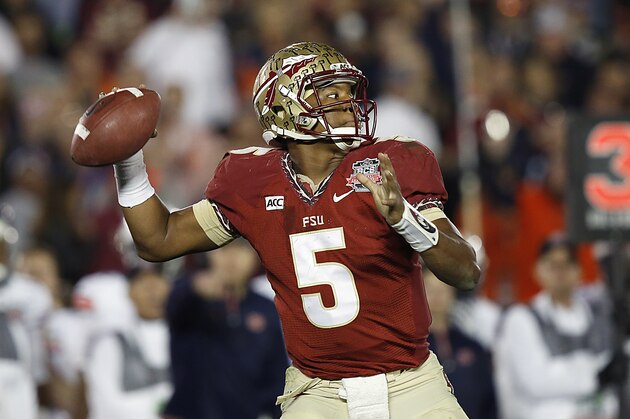 Florida State quarterback Jameis Winston (5) throws a pass against Auburn University in the 2014 BCS Championship NCAA College Football game on Monday, Jan. 6, 2014 in Pasadena, Calif. (AP Photo/Doug Benc)