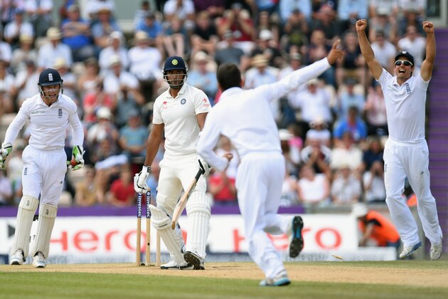 SOUTHAMPTON, ENGLAND - JULY 31:  England bowler Moeen Ali and captain Alastair Cook (r) celebrate after Ali had taken the wicket of India batsman Pankaj Singh to win the match during day five of the 3rd Investec Test  match between England and India at Ageas Bowl on July 31, 2014 in Southampton, England.  (Photo by Stu Forster/Getty Images)