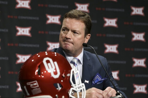 Oklahoma head coach Bob Stoops listens to a reporter's question during the Big 12 Conference NCAA college football media days in Dallas, Tuesday, July 22, 2014. (AP Photo)