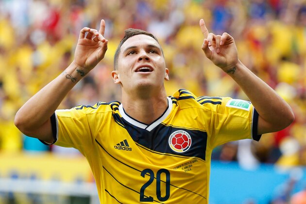 BRASILIA, BRAZIL - JUNE 19:  Juan Fernando Quintero of Colombia celebrates after scoring his team's second goal during the 2014 FIFA World Cup Brazil Group C match between Colombia and Cote D'Ivoire at Estadio Nacional on June 19, 2014 in Brasilia, Brazil.  (Photo by Gabriel Rossi/Getty Images)