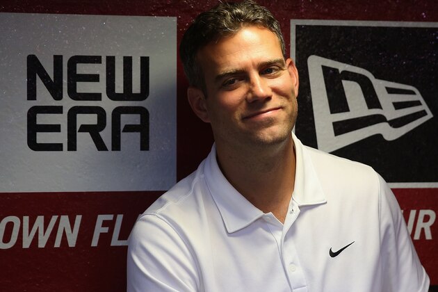 PHOENIX, AZ - JULY 23:  President of Baseball Operations for the Chicago Cubs, Theo Epstein sits in the dugout before the MLB game against the Arizona Diamondbacks at Chase Field on July 23, 2013 in Phoenix, Arizona.  (Photo by Christian Petersen/Getty Images)
