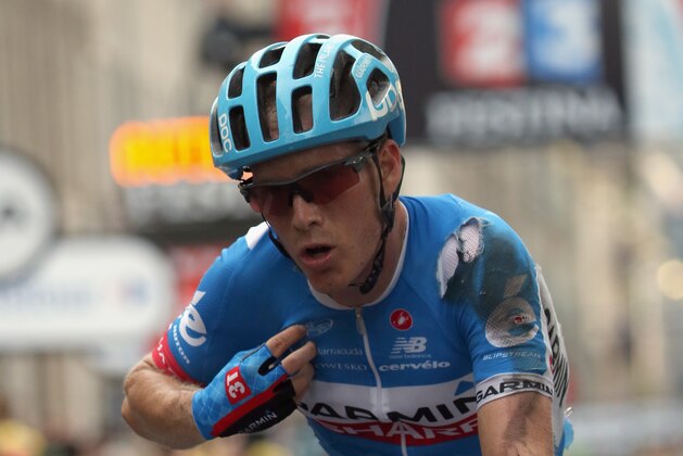 NANCY, FRANCE - JULY 11:  Andrew Talansky of the United States and Garmin-Sharp arrives at the finish line after crashing in the sprint to the finish line in stage seven of the 2014 Le Tour de France from Epernay to Nancy on July 11, 2014 in Nancy, France.  (Photo by Doug Pensinger/Getty Images)