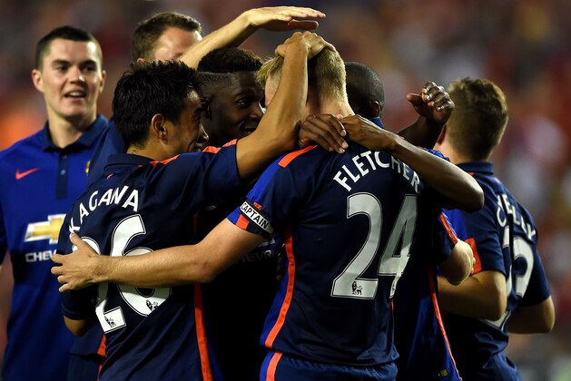 LANDOVER, MD - JULY 29: Darren Fletcher #24 of Manchester United celebrates with teammates after scoring the game-winning goal in penalty shootouts against Inter Milan during their match in the International Champions Cup 2014 at FedExField on July 29, 2014 in Landover, Maryland. Manchester United won, 5-3, in a penalty shootout. (Photo by Patrick Smith/Getty Images) LANDOVER, MD - JULY 29: Darren Fletcher #24 of Manchester United celebrates with teammates after scoring the game-winning goal in penalty shootouts against Inter Milan during their match in the International Champions Cup 2014 at FedExField on July 29, 2014 in Landover, Maryland. Manchester United won, 5-3, in a penalty shootout. (Photo by Patrick Smith/Getty Images)