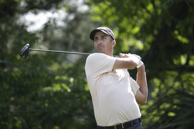 Geoff Ogilvy hits from the fifth tee during the second round of The Players championship golf tournament at TPC Sawgrass, Friday, May 9, 2014 in Ponte Vedra Beach, Fla. (AP Photo/Lynne Sladky)