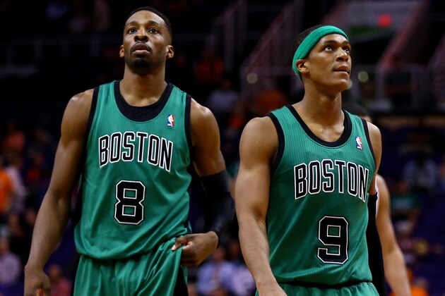 Feb 19, 2014; Phoenix, AZ, USA; Boston Celtics guard Rajon Rondo (9) and forward Jeff Green (8) against the Phoenix Suns at US Airways Center. The Suns defeated the Celtics 100-94. Mandatory Credit: Mark J. Rebilas-USA TODAY Sports