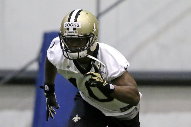 New Orleans Saints first round draft pick Brandin Cooks (10) works out during OTA workouts at their NFL football training facility in Metairie, La., Thursday, June 19, 2014. (AP Photo/Gerald Herbert)