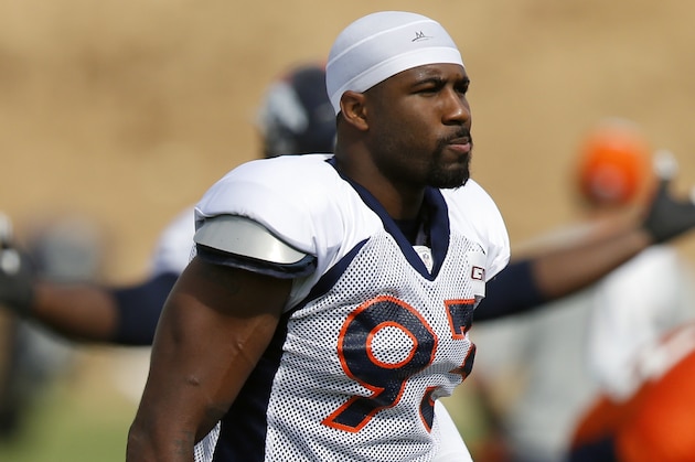 Denver Broncos' Quanterus Smith heads to the practice field during NFL football training camp on Saturday, July 26, 2014, in Englewood, Colo. (AP Photo/Jack Dempsey)