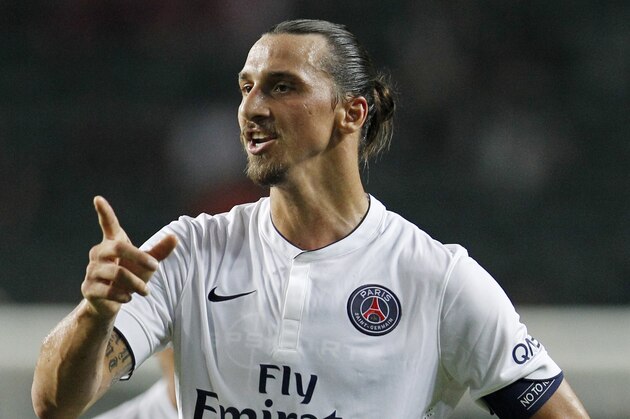 Paris Saint-Germain's Zlatan Ibrahimovic  gestures during a friendly match against Kitchee in Hong Kong Tuesday, July 29, 2014. (AP Photo/Kin Cheung)
