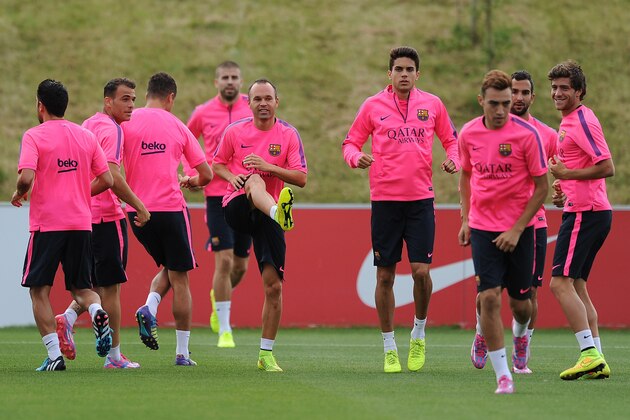 BURTON-UPON-TRENT, ENGLAND - JULY 28: Andres Iniesta (C) of Barcelona in action during the Barcelona Training Session at St George's Park on July 28, 2014 in Burton-upon-Trent, England. (Photo by Chris Brunskill/Getty Images)