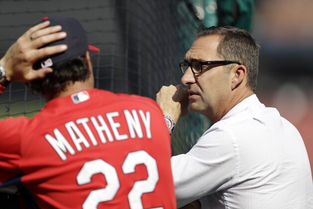 St. Louis Cardinals general manager John Mozeliak, right, talks with manager Mike Matheny during baseball practice Tuesday, Oct. 1, 2013, in St. Louis. The Cardinals are set to play Game 1 of the NLDS Thursday in St. Louis. (AP Photo/Jeff Roberson) St. Louis Cardinals general manager John Mozeliak, right, talks with manager Mike Matheny during baseball practice Tuesday, Oct. 1, 2013, in St. Louis. The Cardinals are set to play Game 1 of the NLDS Thursday in St. Louis. (AP Photo/Jeff Roberson)