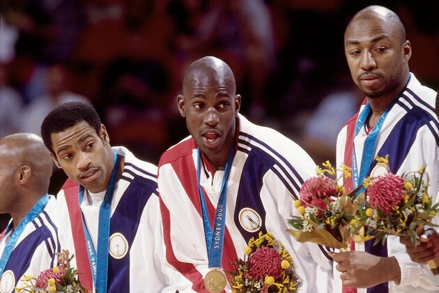SYDNEY - SEPTEMBER 30:  Members of the United States National team (L-R) Vince Carter, Kevin Garnett and Vin Baker pose with their gold medals after defeating the French National team during the 2000 Summer Olympics played September 30, 2000 in Sydney, Australia.  NOTE TO USER: User expressly acknowledges that, by downloading and or using this photograph, User is consenting to the terms and conditions of the Getty Images License agreement. Mandatory Copyright Notice: Copyright 2000 NBAE (Photo by Andrew D. Bernstein/NBAE via Getty Images)