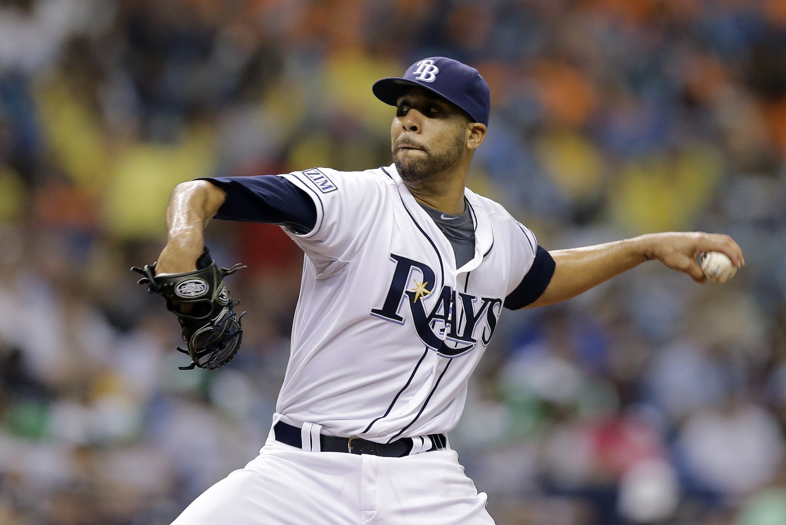 Tampa Bay Rays starting pitcher David Price delivers to the Milwaukee Brewers during the second inning of an interleague baseball game Wednesday, July 30, 2014, in St. Petersburg, Fla. (AP Photo/Chris O'Meara)