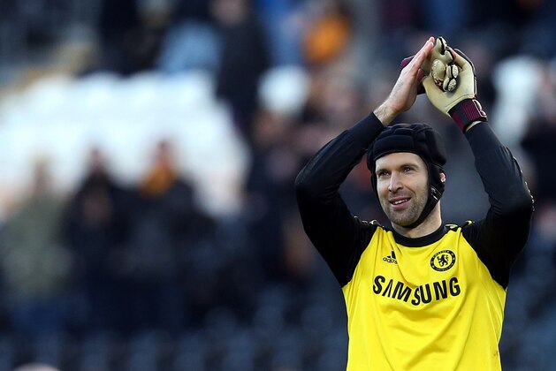 Chelsea's goalkeeper Petr Cech celebrates at the end of their English Premier League soccer match against Hull City at the KC Stadium, Hull, England, Saturday, Jan. 11, 2014. (AP Photo/Scott Heppell)