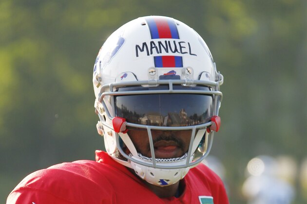 Buffalo Bills quarterback EJ Manuel (3) takes part in drills during NFL football training camp in Pittsford, N.Y., Tuesday, July 22, 2014. (AP Photo/Bill Wippert)