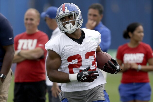 New York Giants running back Rashad Jennings during a NFL football camp in East Rutherford, N.J., Thursday, July 24, 2014. (AP Photo/Seth Wenig)