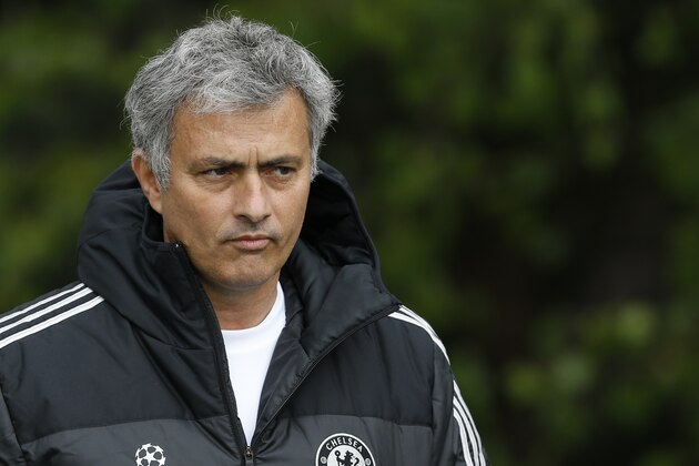 Chelsea manager Jose Mourinho arrives for a training session at Cobham in England, Tuesday, April 29, 2014. Chelsea will play a Champions League semifinal second leg soccer match against Atletico Madrid on Wednesday. (AP Photo/Kirsty Wigglesworth)