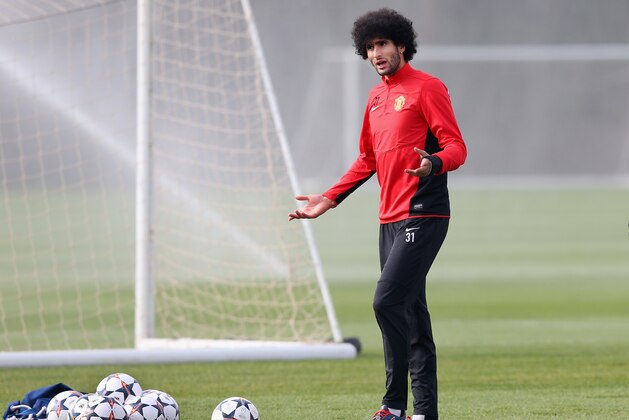 MANCHESTER, ENGLAND - MARCH 31:  Marouane Fellaini of Manchester United looks on during a training session at the Aon Training Complex on March 31, 2014 in Manchester, England.  (Photo by Alex Livesey/Getty Images)