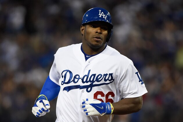 LOS ANGELES, CA - JULY 31:  Yasiel Puig #66 of the Los Angeles Dodgers runs the bases after hitting a homerun in the third inning against the Atlanta Braves at Dodger Stadium on July 31, 2014 in Los Angeles, California.  (Photo by Lisa Blumenfeld/Getty Images)