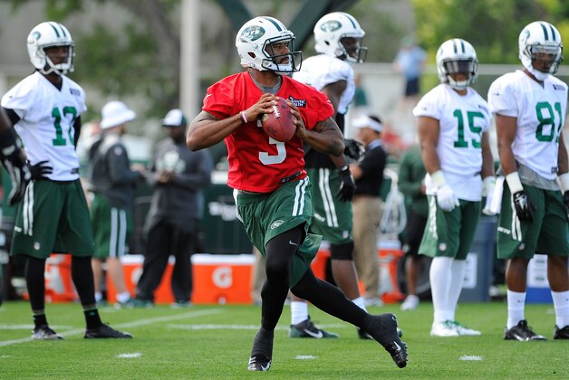 Jul 24, 2014; Cortland, NY, USA; New York Jets quarterback Tajh Boyd (3) drops back to pass during training camp at SUNY Cortland. Mandatory Credit: Rich Barnes-USA TODAY Sports