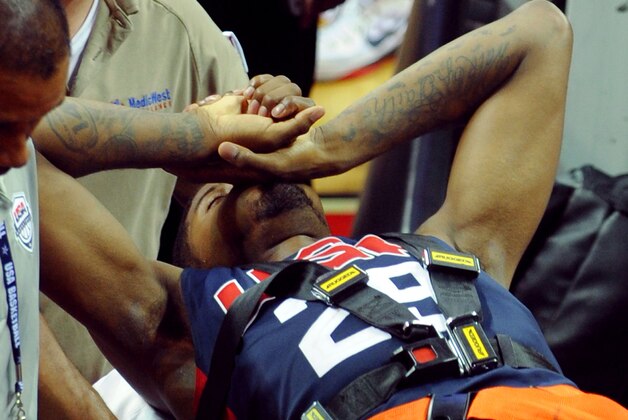 Aug 1, 2014; Las Vegas, NV, USA; Team USA guard Paul George is carted off the floor on a gurney after suffering a lower leg injury during the USA Basketball Showcase at Thomas & Mack Center. Mandatory Credit: Stephen R. Sylvanie-USA TODAY Sports