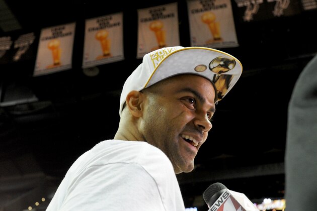 SAN ANTONIO, TX - JUNE 15:  Tony Parker #9 of the San Antonio Spurs speaks with local news after the San Antonio Spurs victory in Game Five and winning the 2014 NBA Finals between the Miami Heat and San Antonio Spurs at AT&T Center on June 15, 2014 in San Antonio, Texas. NOTE TO USER: User expressly acknowledges and agrees that, by downloading and/or using this photograph, user is consenting to the terms and conditions of the Getty Images License Agreement.  Mandatory Copyright Notice: Copyright 2014 NBAE (Photo by Andrew D Bernstein/NBAE via Getty Images)