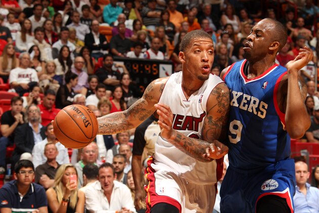 MIAMI, FL - April 16: Michael Beasley #8 of the Miami Heat drives against the Philadelphia 76ers at the American Airlines Arena in Miami, Florida on April 16, 2014. NOTE TO USER: User expressly acknowledges and agrees that, by downloading and/or using this photograph, user is consenting to the terms and conditions of the Getty Images License Agreement. Mandatory copyright notice: Copyright NBAE 2014 (Photo by Issac Baldizon/NBAE via Getty Images)