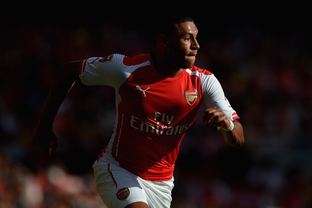 LONDON, ENGLAND - AUGUST 03:  Alex Oxlade-Chamberlain of Arsenal looks on during the Emirates Cup match between Arsenal and AS Monaco at the Emirates Stadium on August 3, 2014 in London, England.  (Photo by Michael Regan/Getty Images)