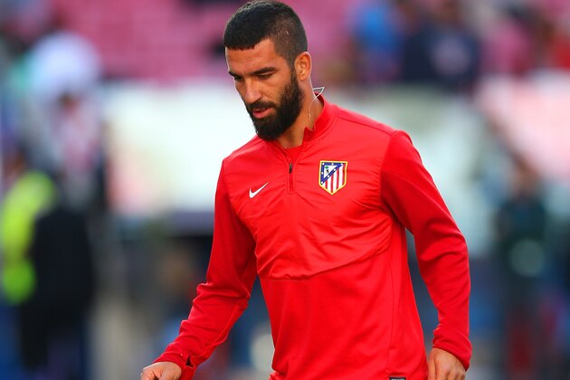 LISBON, PORTUGAL - MAY 23: Arda Turan of Club Atletico de Madrid on the ball uring a Club Atletico de Madrid training session ahead of the UEFA Champions League Final against Real Madrid at Estadio da Luz on May 23, 2014 in Lisbon, Portugal.  (Photo by Alex Livesey/Getty Images)