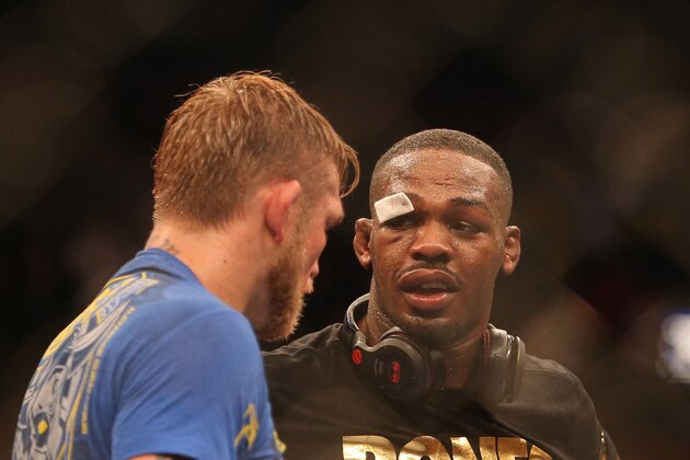 Sep 21, 2013; Toronto, Ontario, CAN; Jon Jones talks to Alexander Gustafsson (left) after their Light Heavyweight Championship bout while wearing the championship belt at UFC 165 at the Air Canada Centre. Mandatory Credit: Tom Szczerbowski-USA TODAY Sports