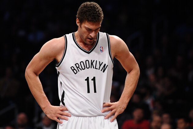 NEW YORK, NY - DECEMBER 12:  Brook Lopez #11 of the Brooklyn Nets looks on during the first half against the Los Angeles Clippers at Barclays Center on December 12, 2013 in the Brooklyn borough of New York City. NOTE TO USER: User expressly acknowledges and agrees that, by downloading and/or using this photograph, user is consenting to the terms and conditions of the Getty Images License Agreement.  (Photo by Maddie Meyer/Getty Images)