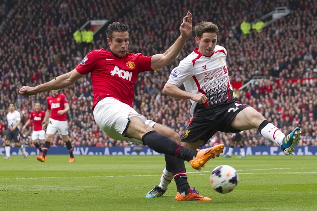 Manchester United's Robin van Persie, fights for the ball against Liverpool's Joe Allen during their English Premier League soccer match at Old Trafford Stadium, Manchester, England, Sunday March 16, 2014. (AP Photo/Jon Super)
