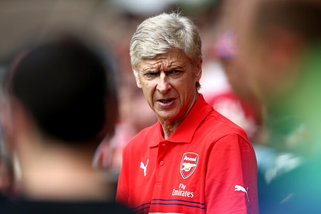 BOREHAMWOOD, ENGLAND - JULY 19:  Arsenal manager Arsene Wenger looks on during the pre season friendly match between Borehamwood and Arsenal at Meadow Park on July 19, 2014 in Borehamwood, England.  (Photo by Jordan Mansfield/Getty Images)