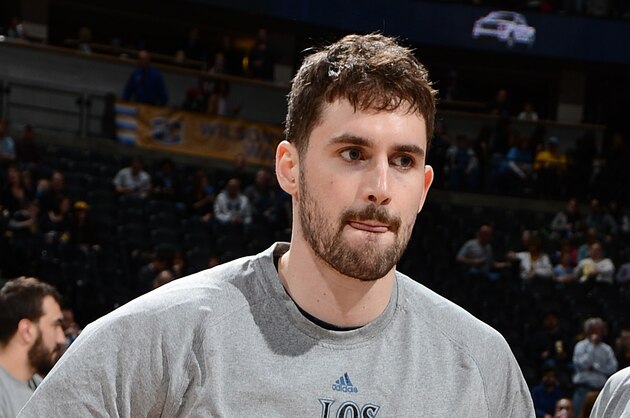 DENVER, CO - MARCH 3: Kevin Love #42 of the Minnesota Timberwolves gets introduced before a game against the Denver Nuggets on March 3, 2014 at the Pepsi Center in Denver, Colorado. NOTE TO USER: User expressly acknowledges and agrees that, by downloading and/or using this Photograph, user is consenting to the terms and conditions of the Getty Images License Agreement. Mandatory Copyright Notice: Copyright 2014 NBAE (Photo by Garrett W. Ellwood/NBAE via Getty Images)