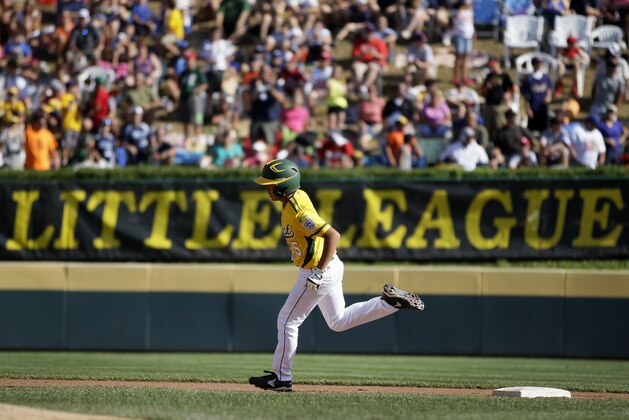 Chula VIsta, Calif.'s Nick Mora (5) rounds second after hitting a three-run home run off Westport, Conn., pitcher Chad Knight in second inning of the United States Championship game at the Little League World Series tournament in South Williamsport, Pa., Saturday, Aug. 24, 2013. (AP Photo/Matt Slocum)
