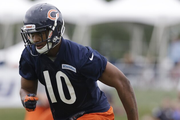 Chicago Bears wide receiver Marquess Wilson runs during NFL football training camp Friday, July 26, 2013, at Olivet Nazarene University in Bourbonnais, Ill. (AP Photo/Nam Y. Huh)